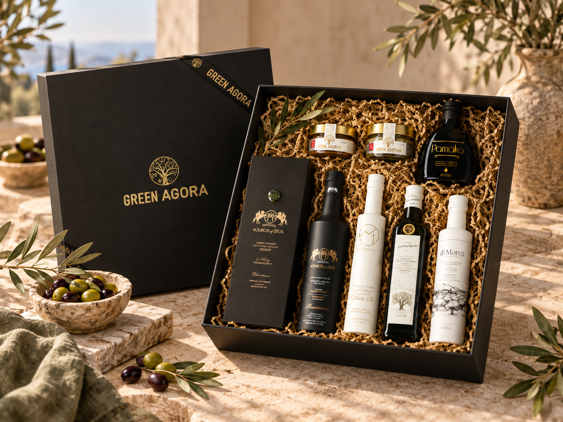 Green Agora Weihnachtsgeschenk für Kunden und Geschäftspartner mit ausgewählten Premium Olivenölen und Feinkost in schwarzer GreenLife Geschenkbox mit goldener Firmierung, Olivenzweigen und mediterraner Präsentation.